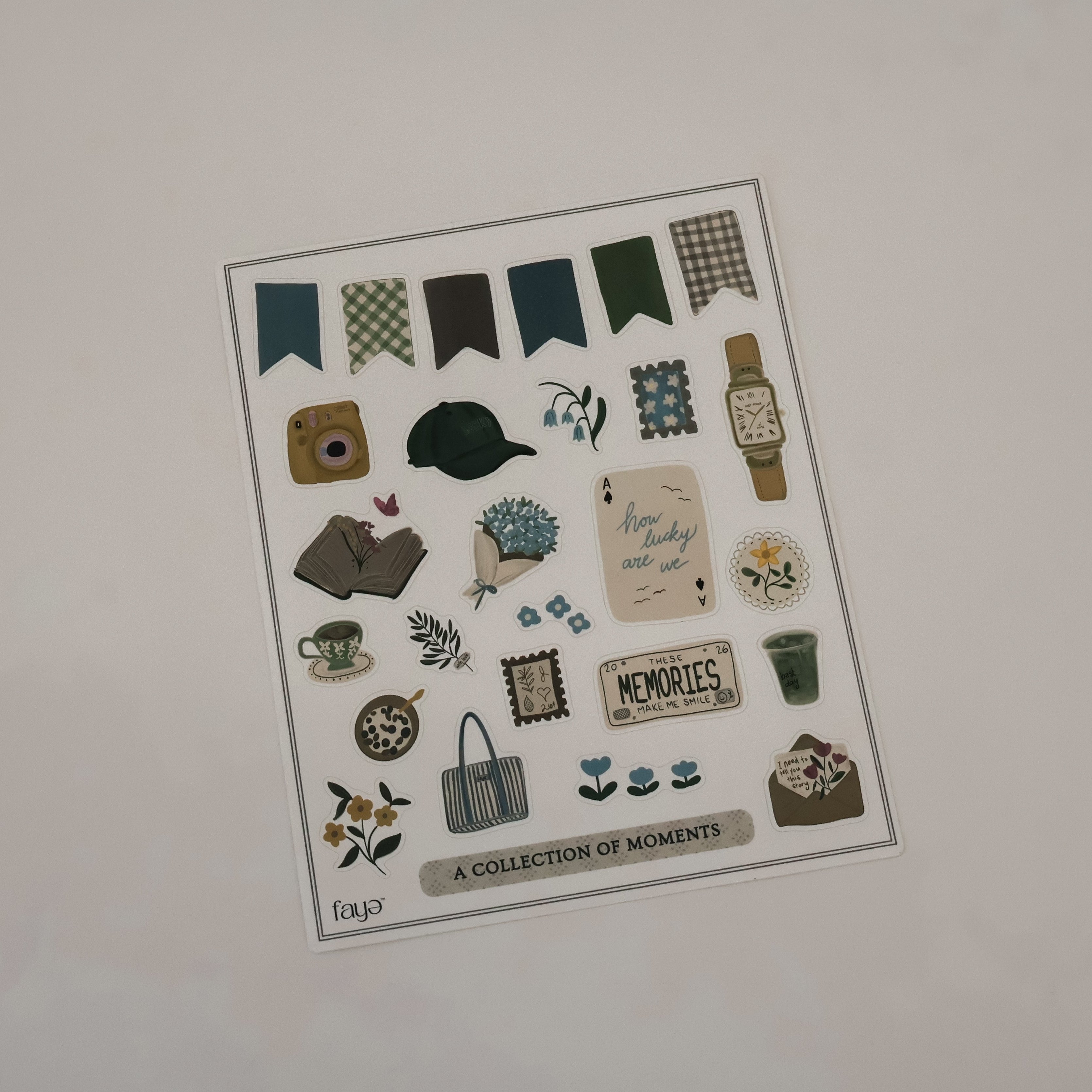 Sheet of decorative stickers on a plain background