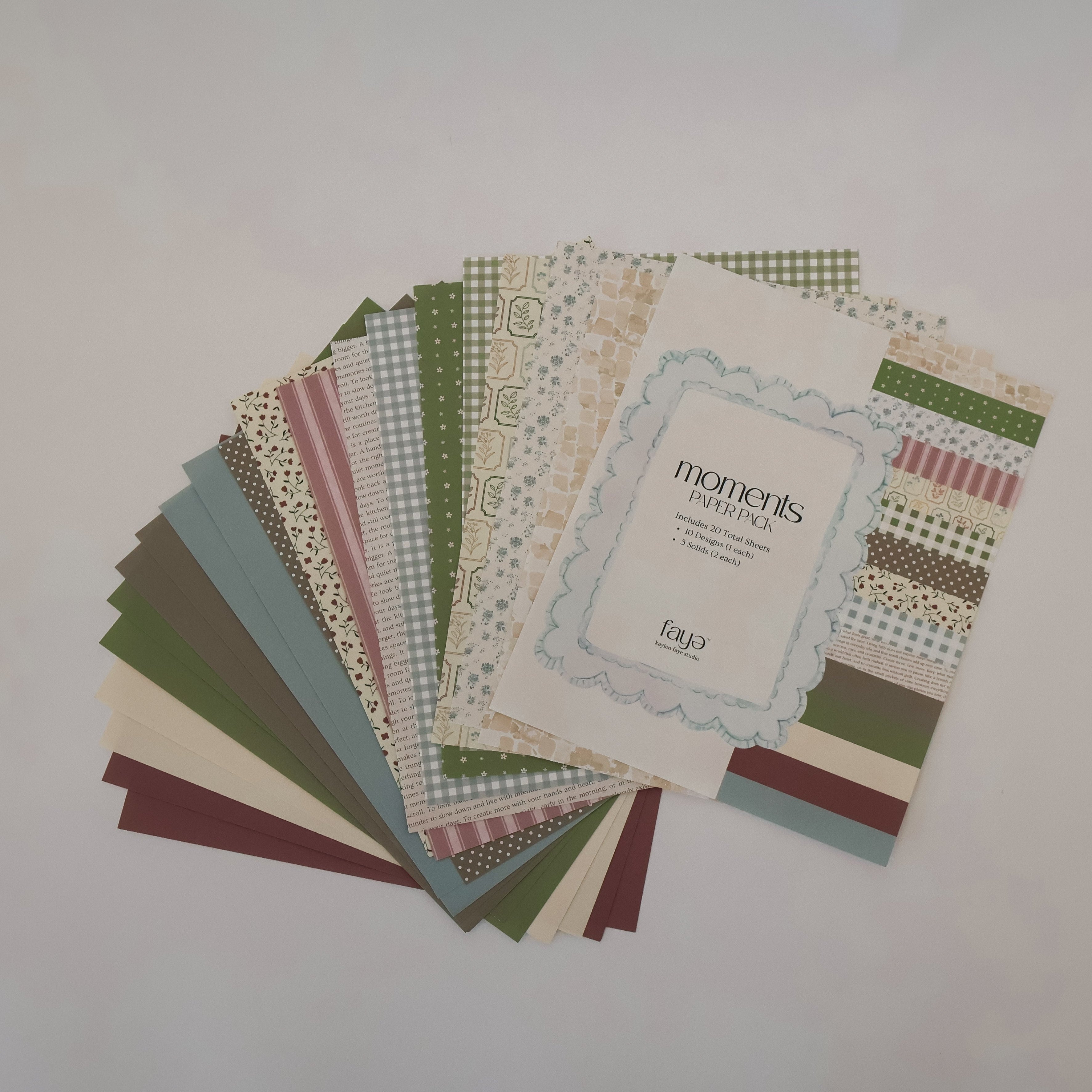 Collection of patterned paper sheets on a white background