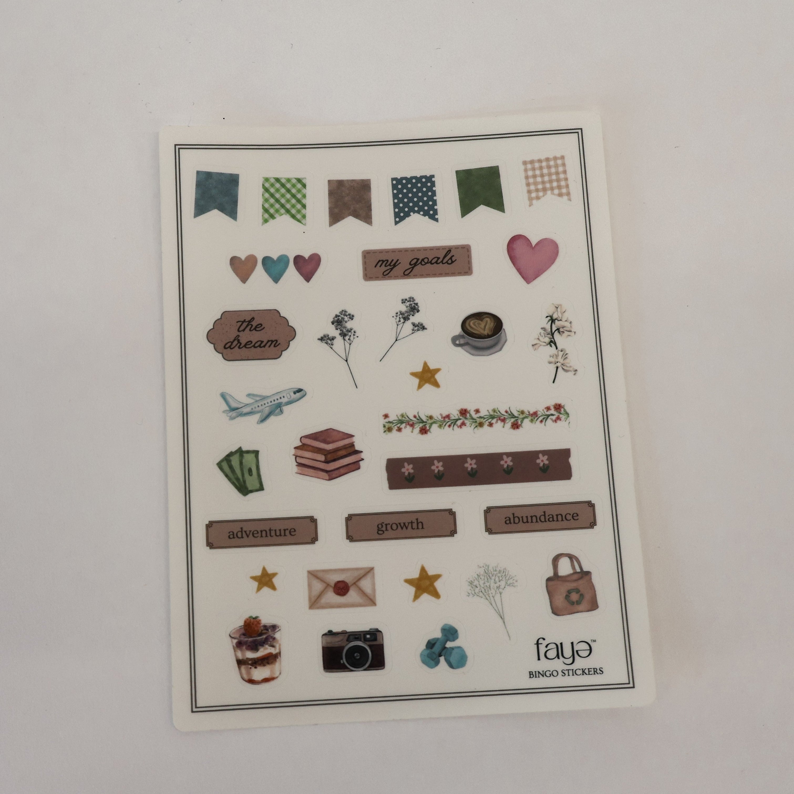 Sheet of decorative stickers with various designs on a white background